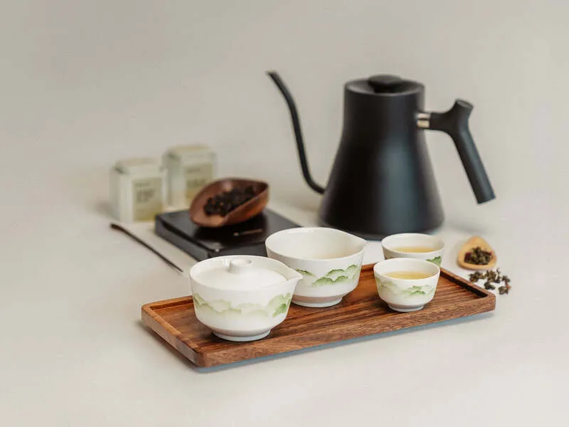 Elegant gaiwan brewing technique during a private tea tasting